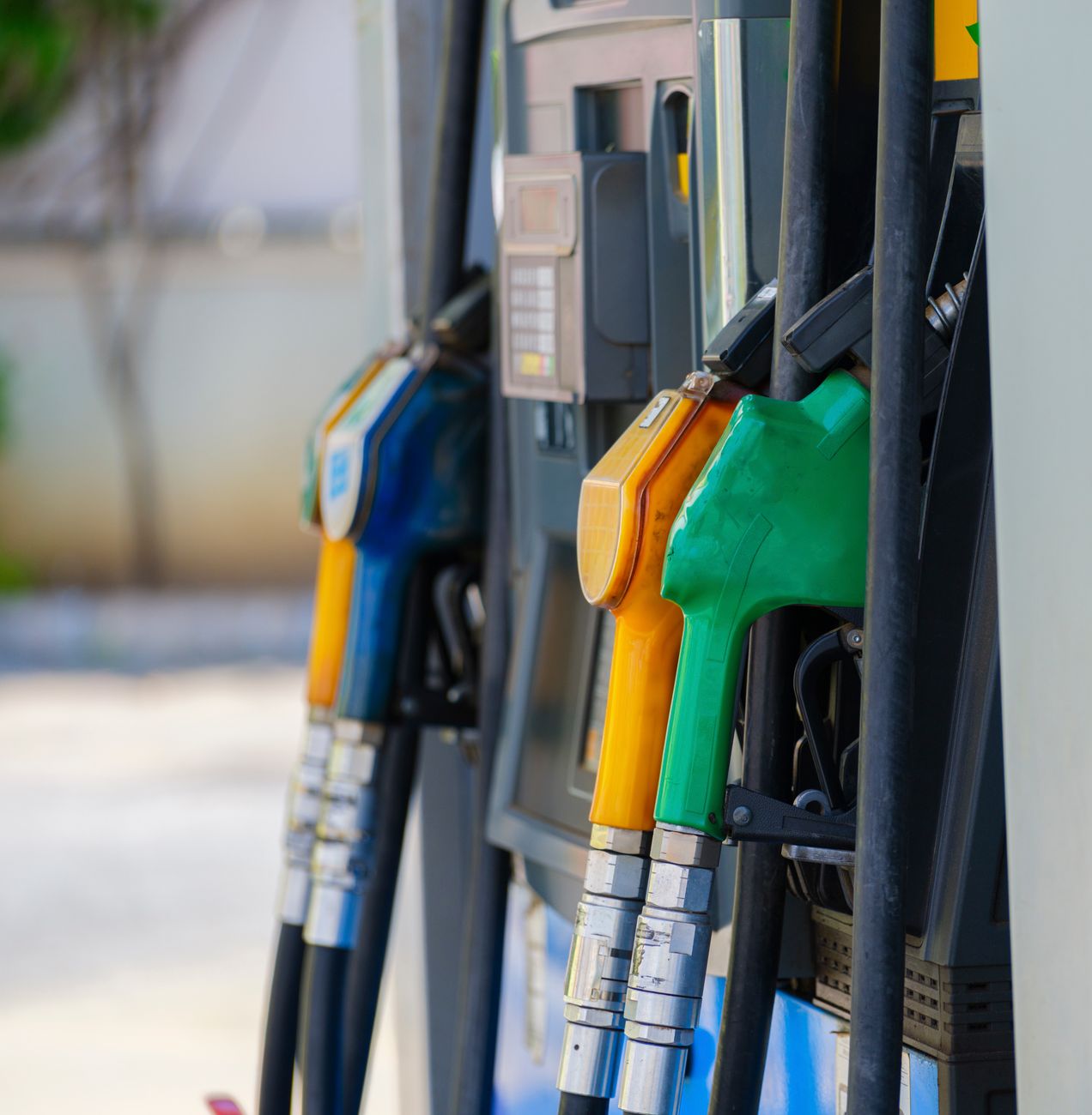 gasoline pumps in close up photography